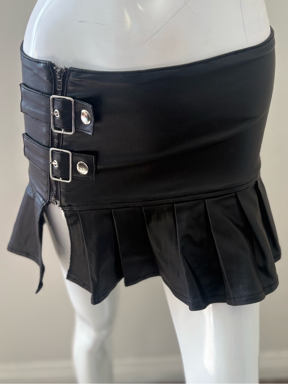Edikted Black Pleated Faux Leather Coated Mini Skirt w Double Buckle Detail
